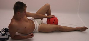 posing nude in basket ball uniform